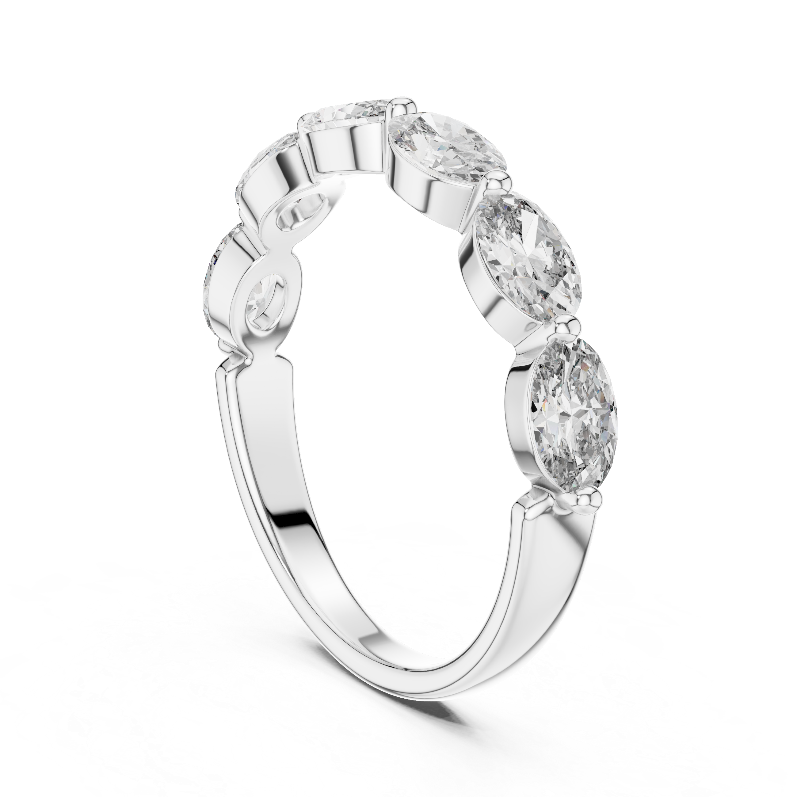 Silver ring with three clear gemstones on a white background